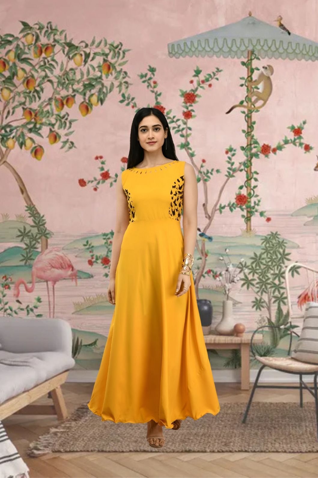 Front view of yellow sleeveless crepe gown in palace backdrop