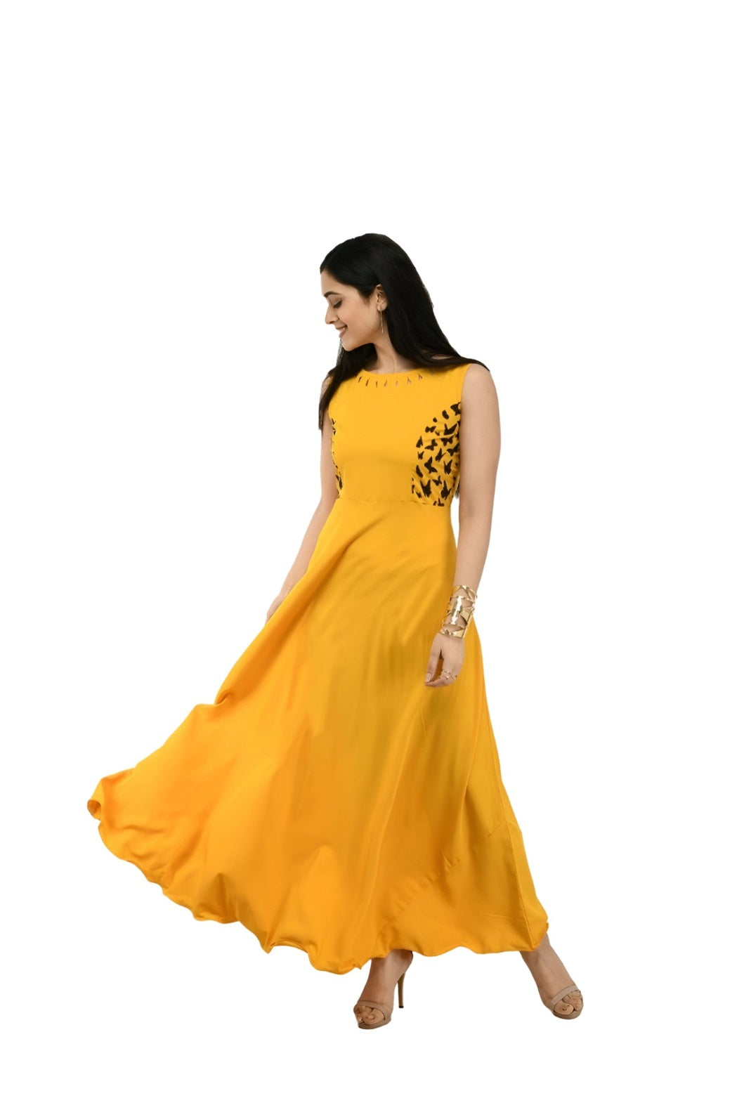 Studio right profile of bright yellow floor-length gown