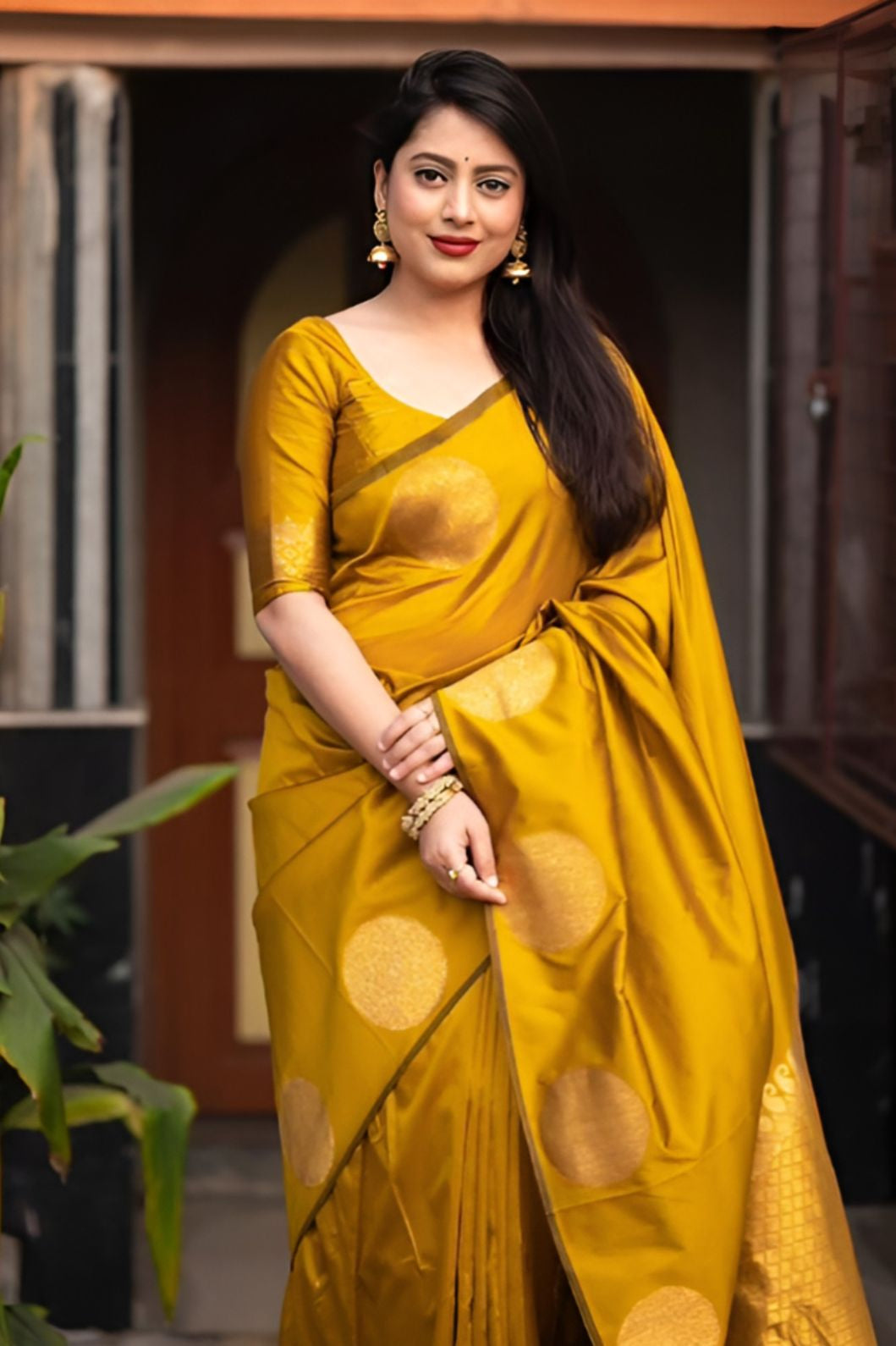 front view of yellow printed silk saree