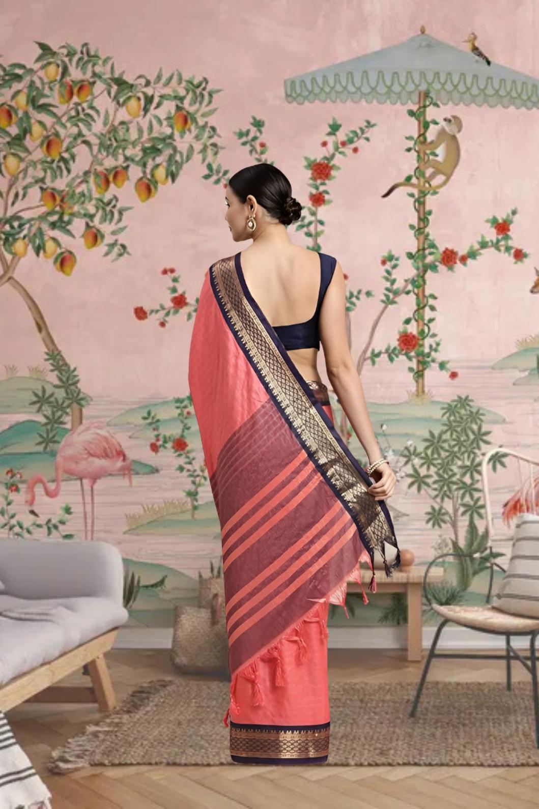 Rear view showing soft pink pallu fall and blouse pairing