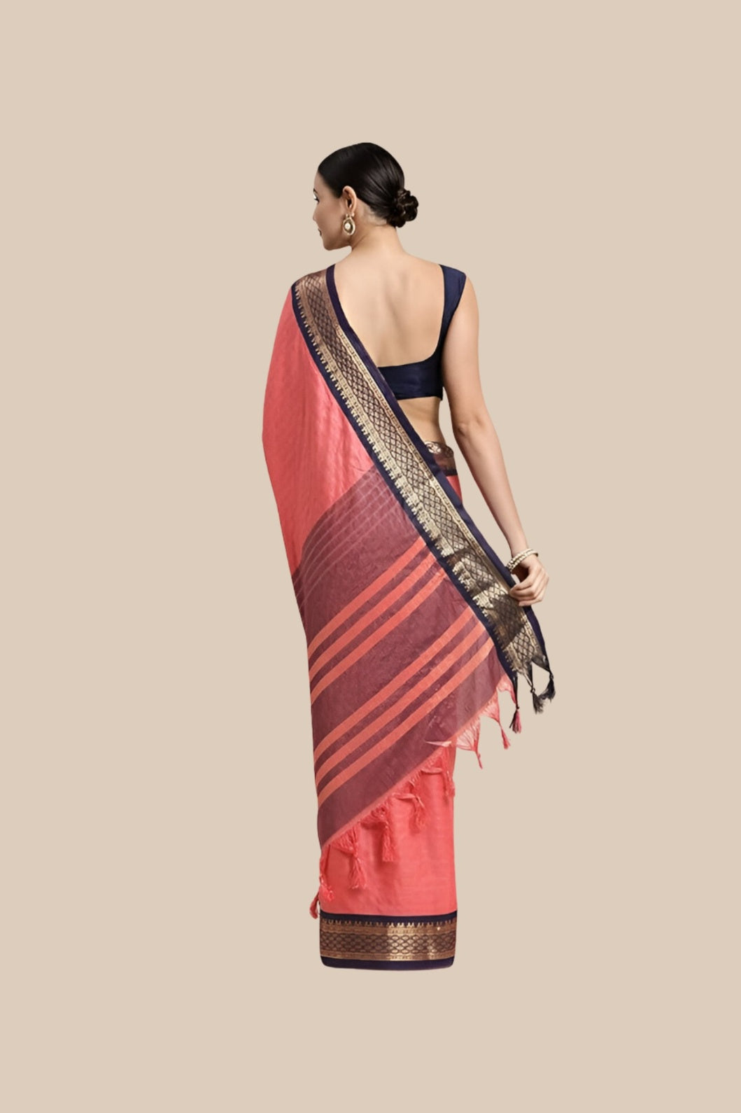 Studio rear angle showcasing pallu fall and blouse match