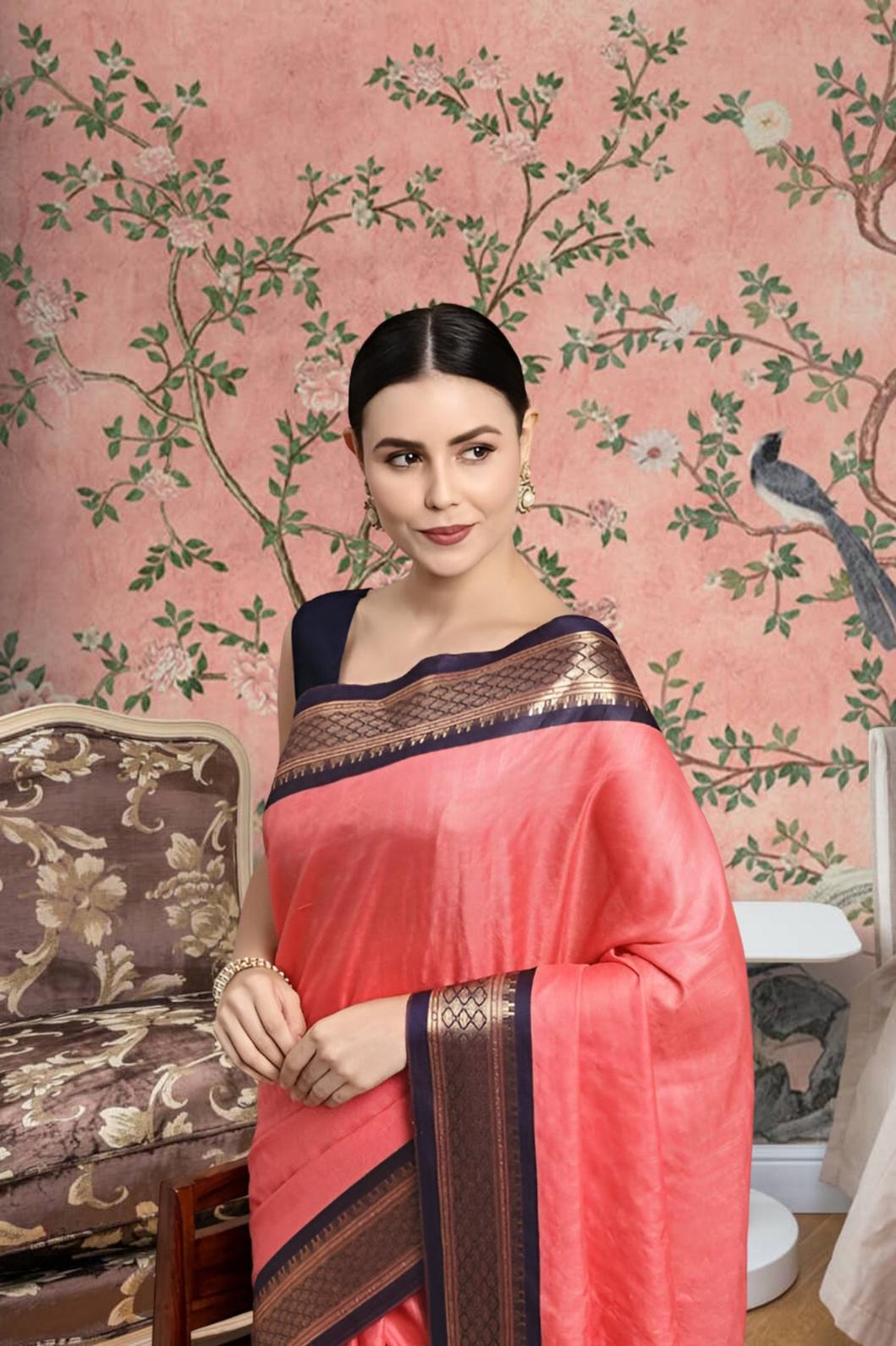 Front view of pink checkered saree in elegant indoor setting