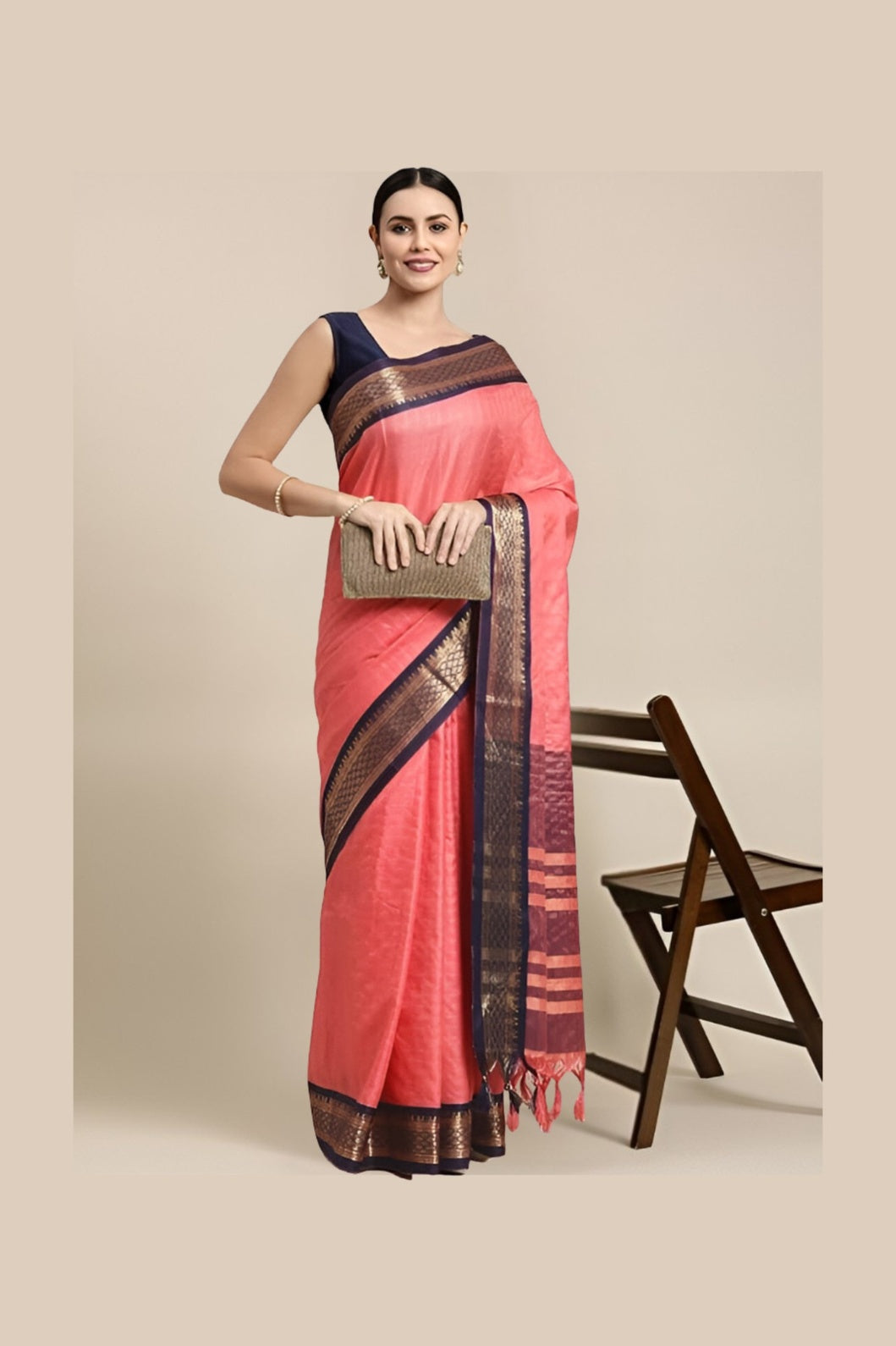 Studio front shot of pink saree with checkered body and border