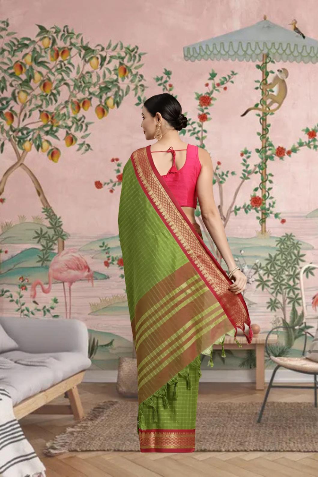 Rear shot showing green pallu draped with timeless grace