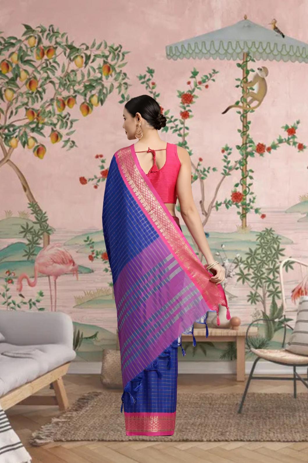 Rear view showcasing deep blue pallu fall with intricate checks