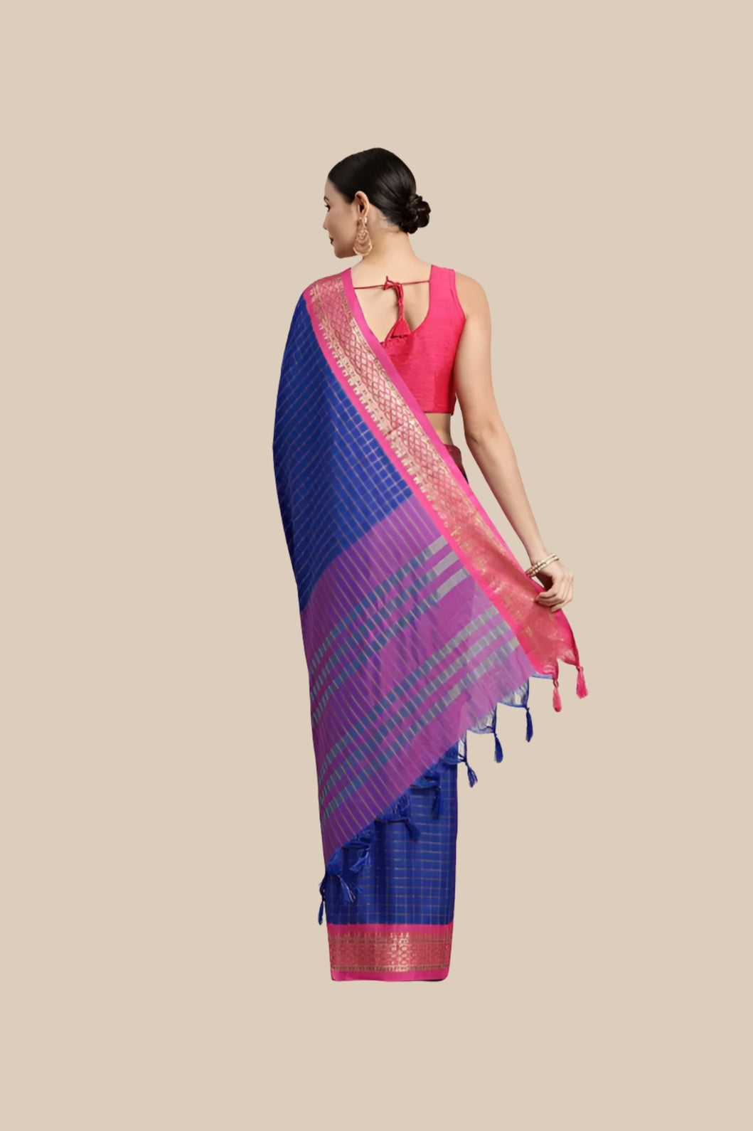 Rear view with plain backdrop showing clean pallu structure