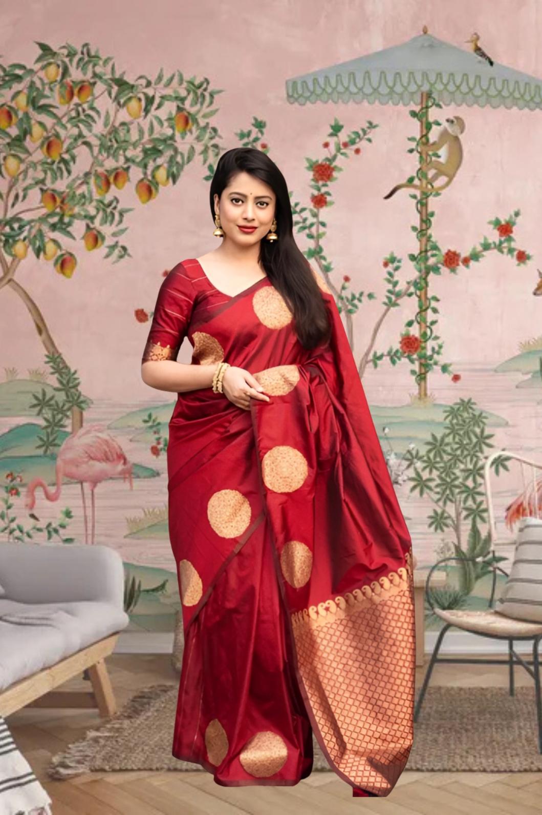 Front view of red silk saree blazing in royal setting