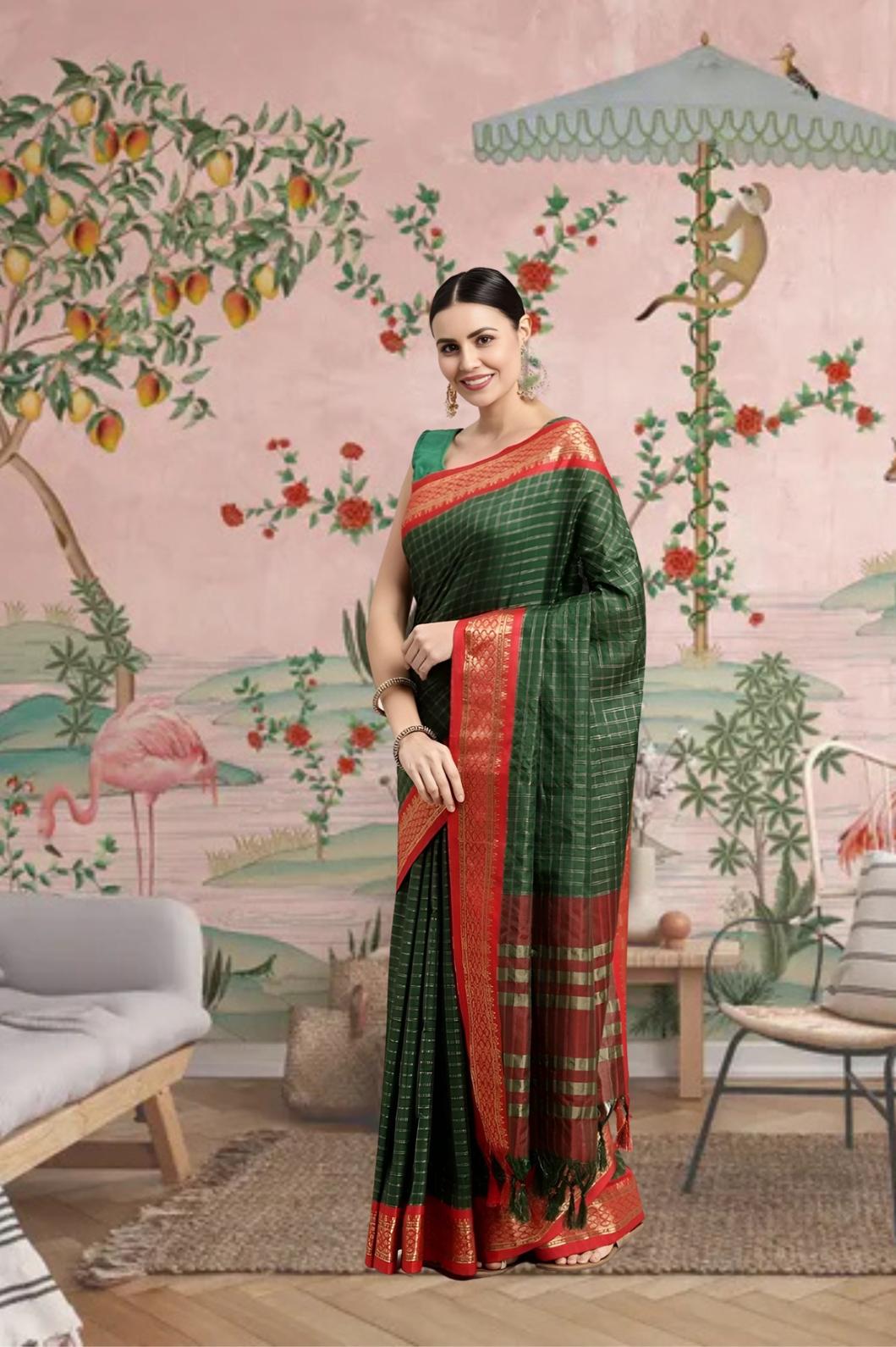 Front view of bottle green cotton silk checkered saree glowing in royal setting