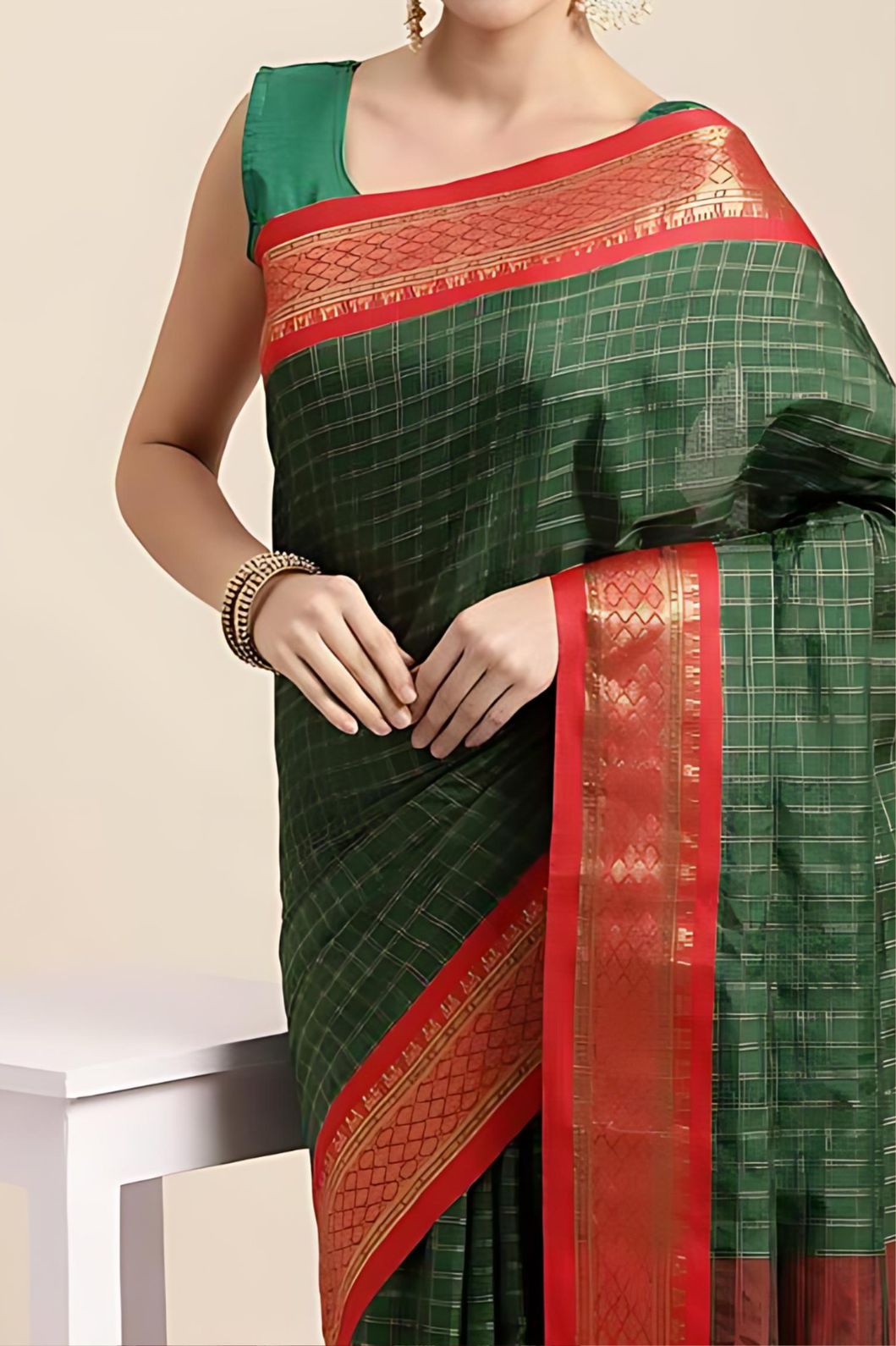 Studio close-up of bottle green pallu texture and weave