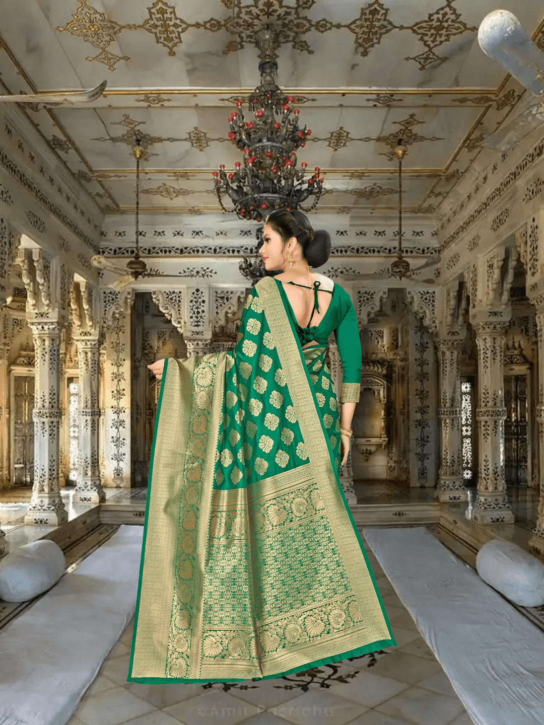 Golden border of green Banarasi saree gleaming in heritage setting