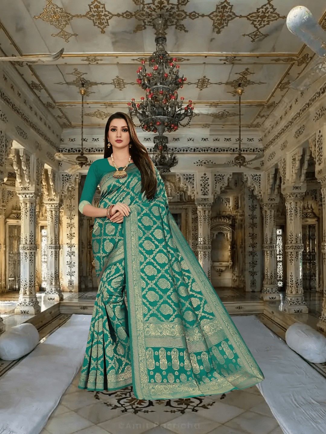 Green Kanjivaram silk saree glowing under temple light, gold threads catching firelight