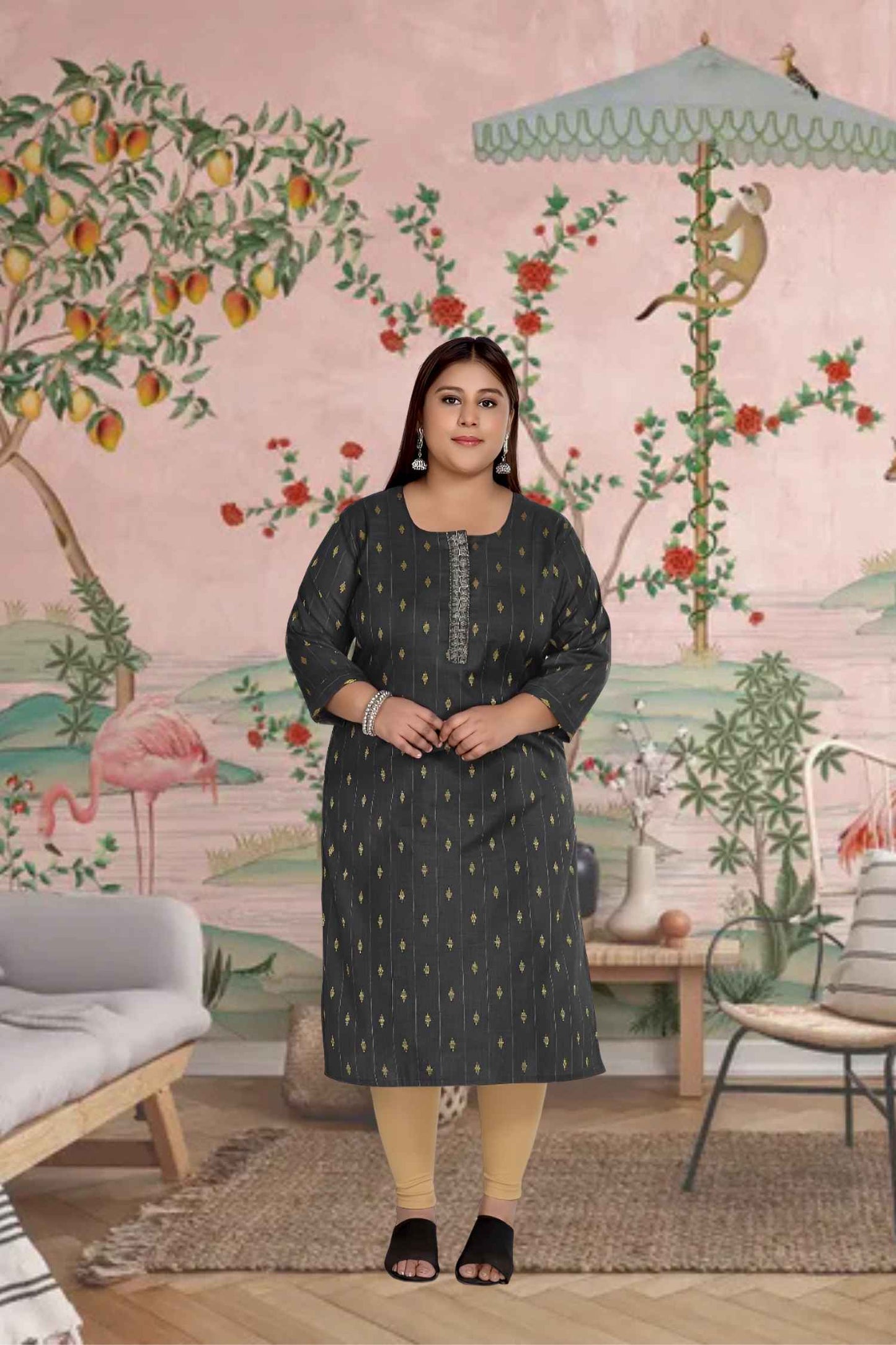 Front view: Black kurti with glowing embroidery under soft light