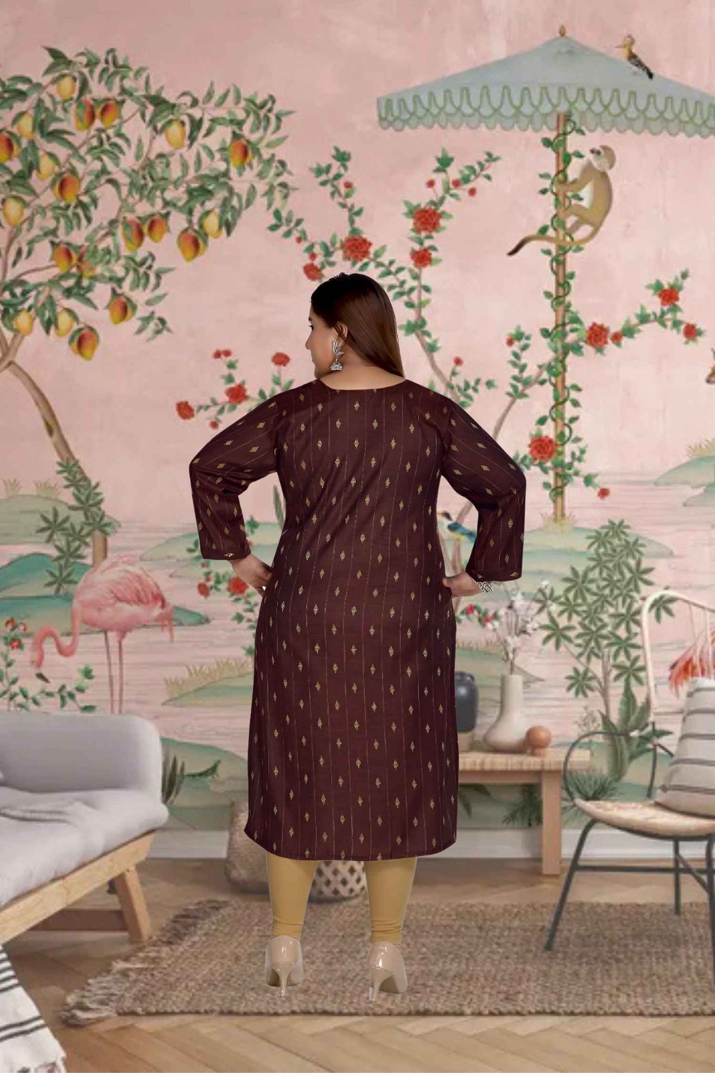 Rear angle highlighting flowing gold embroidery