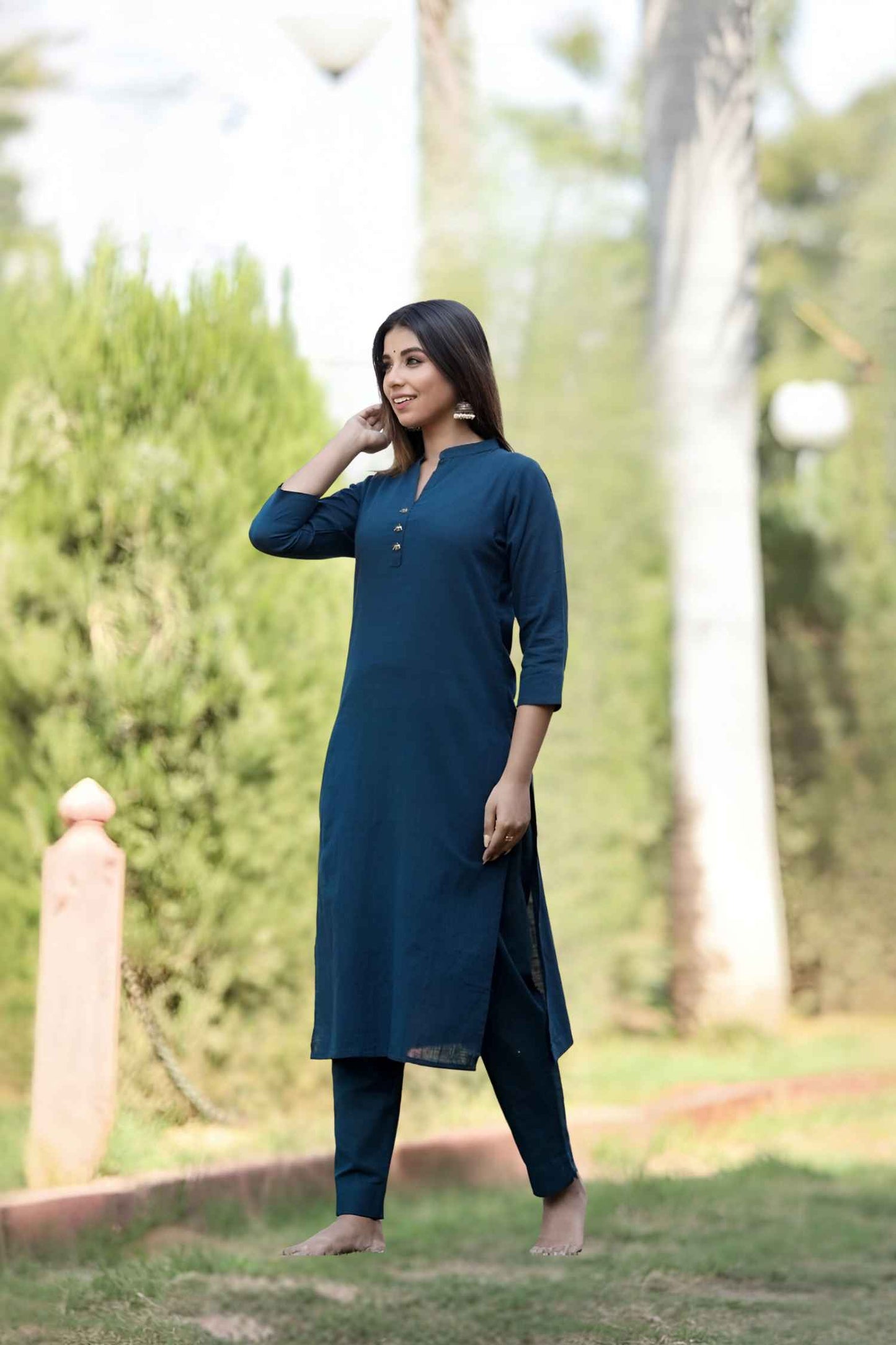 Front view: Blue kurti glowing under a twilight sky