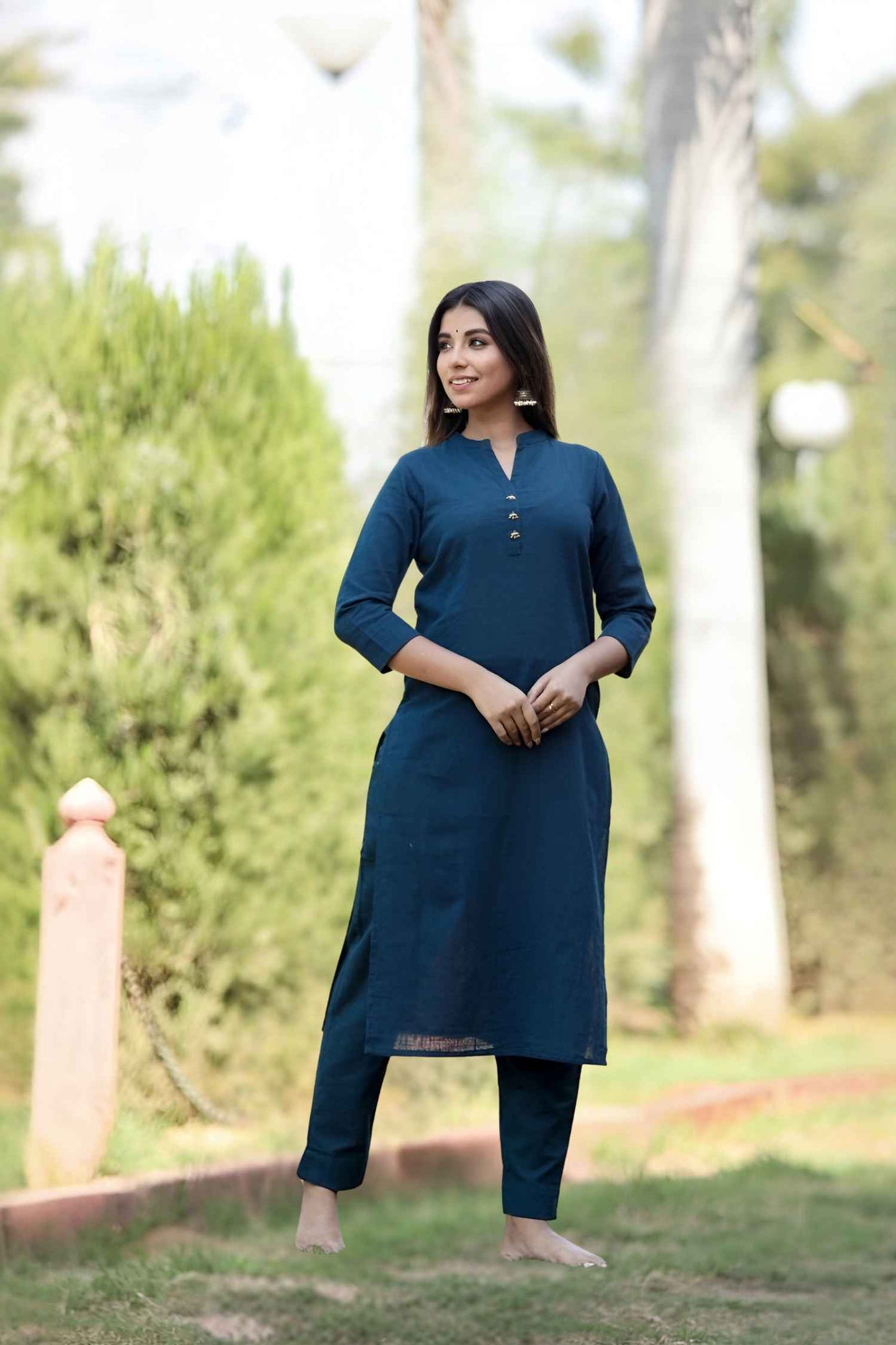 Front view: Blue kurti glowing under a twilight sky