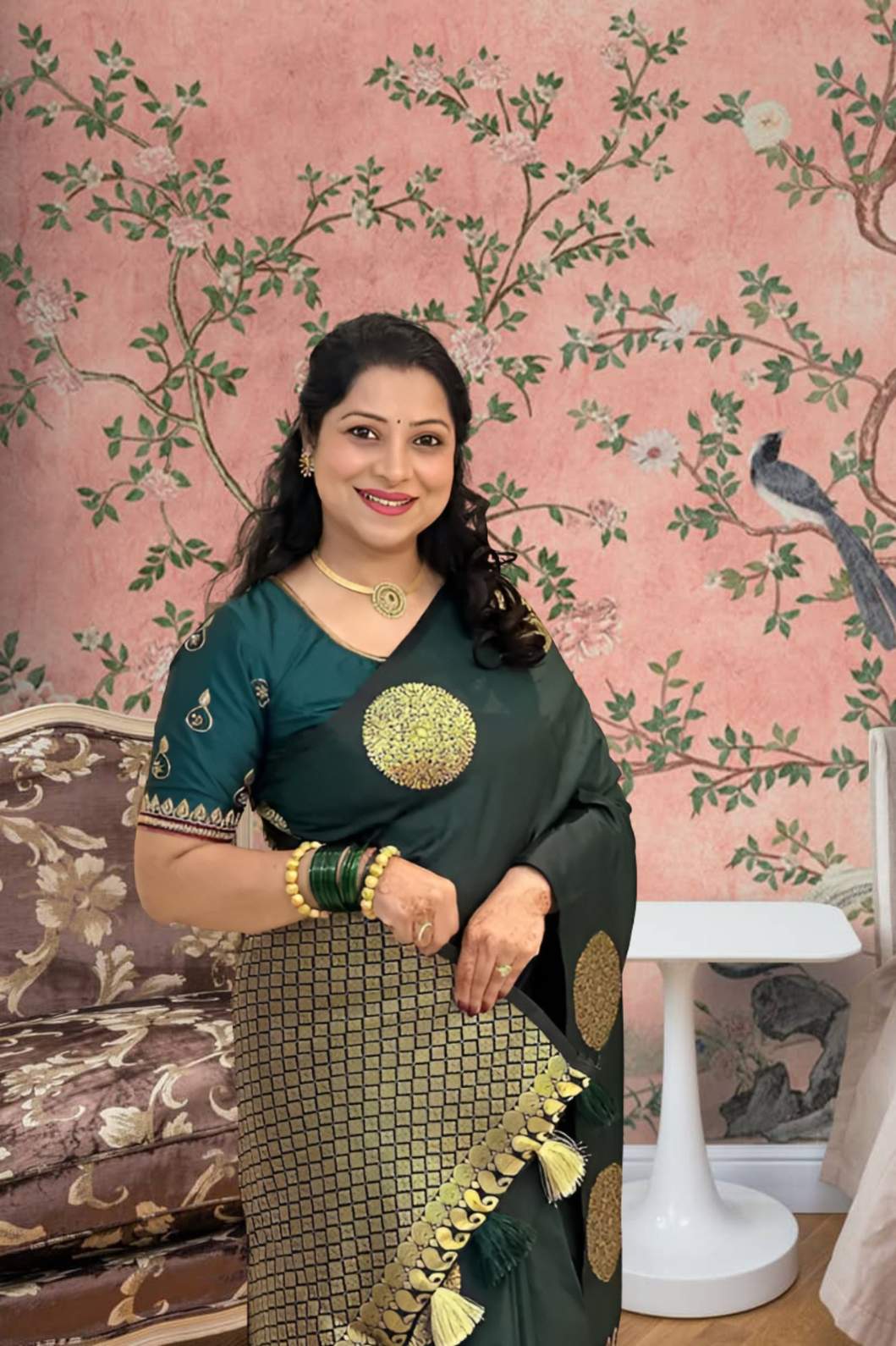 Front view of green printed silk saree in royal setting