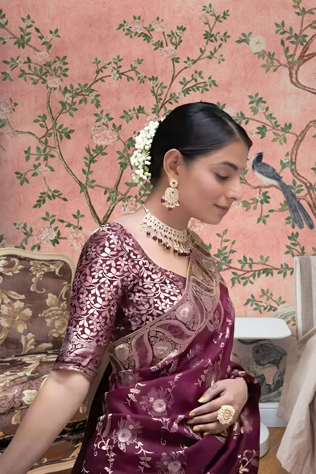 Close-up of embellished blouse glowing in palace lights