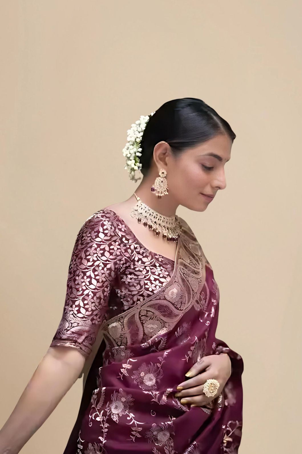 Close-up of embellished blouse glowing in palace lights