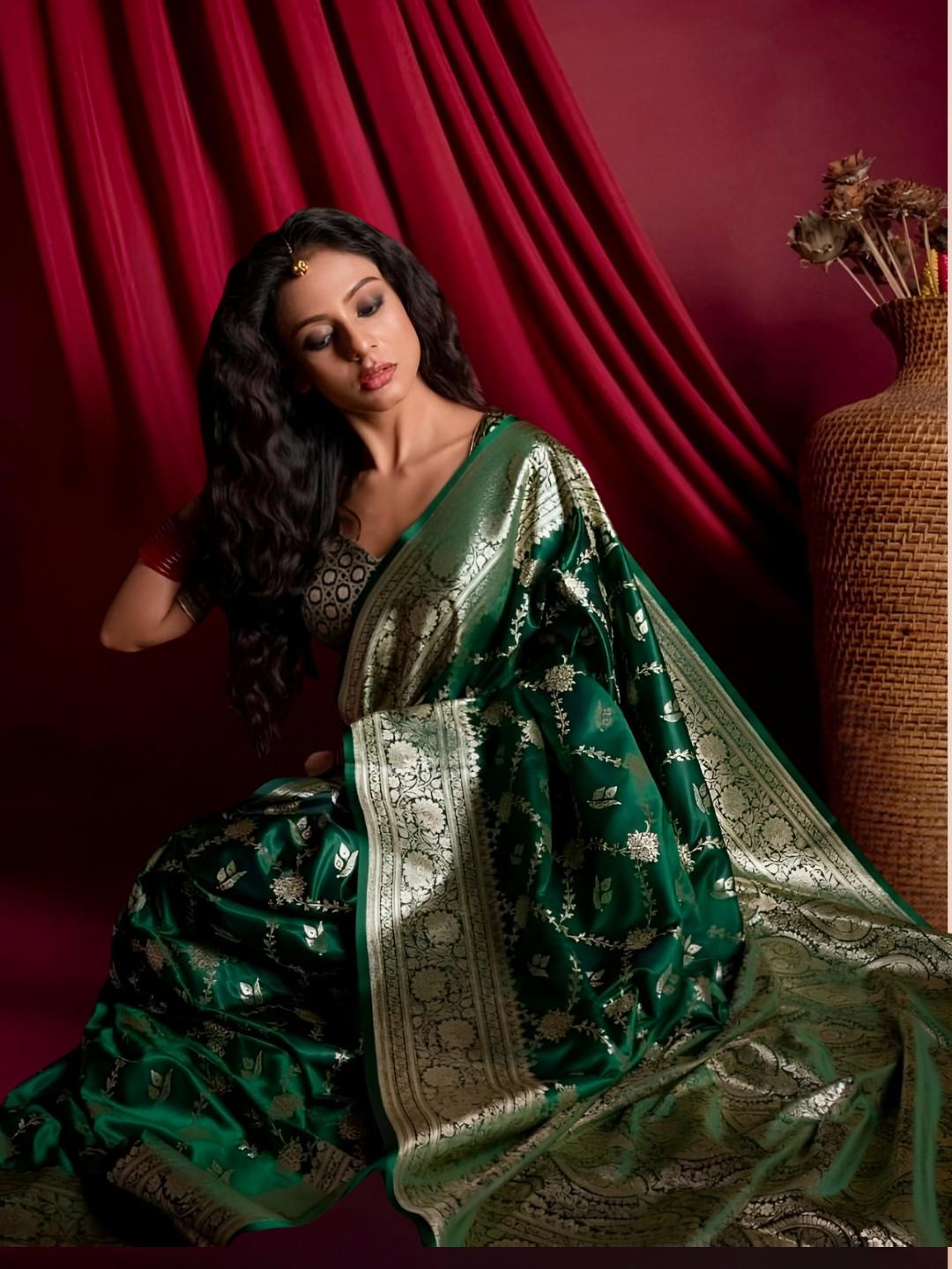 Model showcasing Zarqa Veil saree in an opulent palace setup