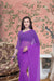  Front view of deep purple solid saree in majestic setting