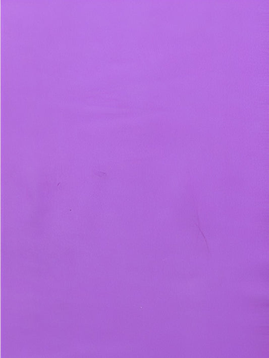 Studio close-up showing purple depth and sheen