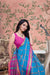  Front view of sky blue saree glowing in heritage palace setting