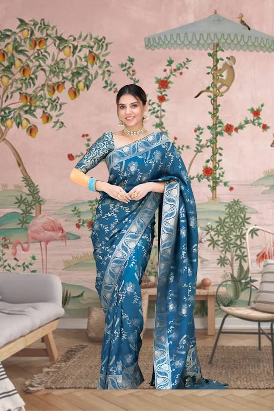 Front view showing Rama green silk saree glowing in palace lights