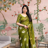 Front angle of green printed cotton crape saree glowing in regal palace light