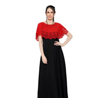 Studio front shot of red-black sleeveless crepe gown