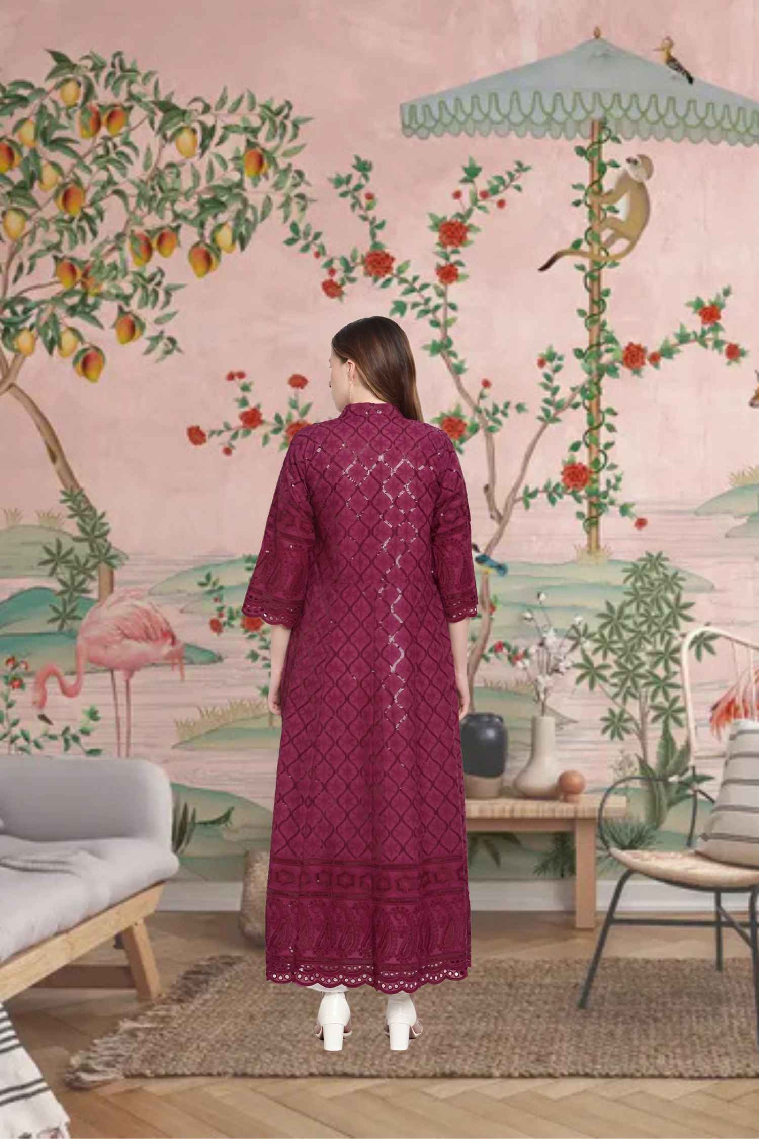 Rear view showing intricate embroidery glowing under the night sky