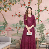 Front view: Purple kurti with shimmering amethyst embroidery in a twilight setting
