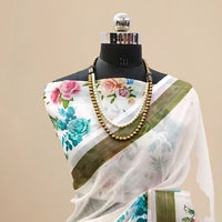 Studio front view showing full saree design and blouse pairing