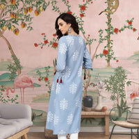 Back view with embroidery fluttering softly