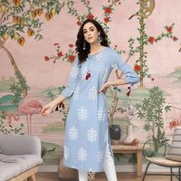 Front view: Blue kurti set against an open blue sky