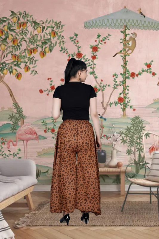  Back view showing fierce print of brown palazzo pants