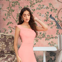 Front view of Celestina’s Blush Mirage peach sleeveless knit dress