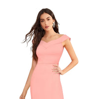 Front-facing view of Blush Mirage peach knit dress on plain backdrop