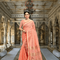 Side drape showing airy pallu in soft peach cotton, gold lines catching the studio light