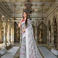 Elegant folds of grey cotton saree captured mid-frame in standing position
