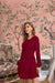 Front view of Crimson Aether Maroon dress with full sleeves and round neckline