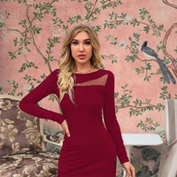 Red dress on model – confidence and charisma framed in fire