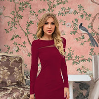 Model wearing Crimson Cadenza dress – bold red front view with attitude