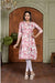 Front view: Red kurti against a fiery, glowing backdrop