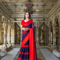 Model twirling red-to-navy solid saree at palace