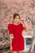 Front view of Crimson Covenant dress in bold red with puff sleeves