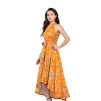 Side profile of yellow floral dress with playful above-knee hemline, isolated on pure white