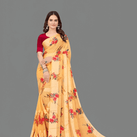 Beige satin patta saree flowing in desert wind