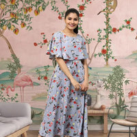 Front view of light grey floral gown for women in palace room setting