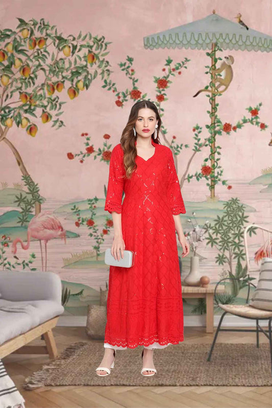  Front view: Scarlet kurti glowing against a firelit backdrop