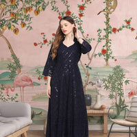 Front view: Navy kurti with midnight embroidery under moonlight